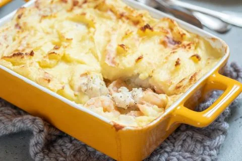 Fish pie topped with mashed potato Stock Photos