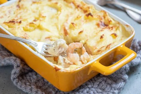 Fish pie topped with mashed potato Stock Photos