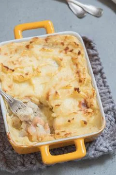 Fish pie topped with mashed potato Stock Photos