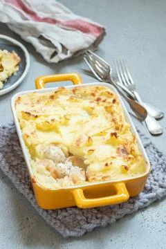 Fish pie topped with mashed potato Stock Photos