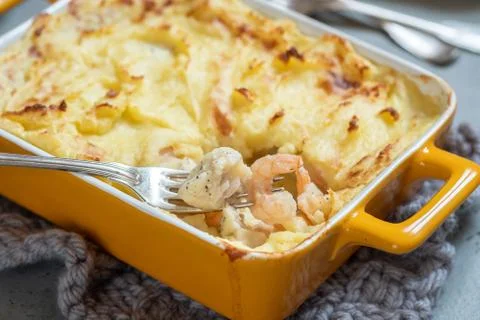 Fish pie topped with mashed potato Stock Photos