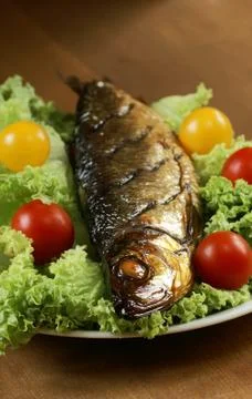 Fish on plate Stock Photos