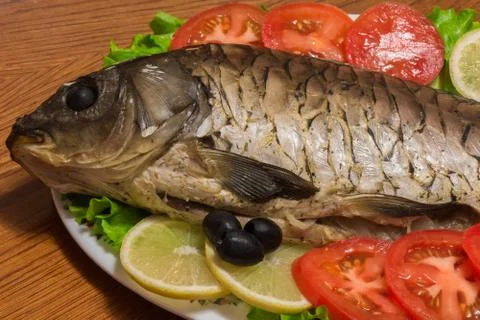 Fish on a plate Stock Photos
