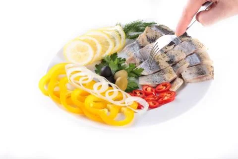 Fish on plate with vegetables Stock Photos