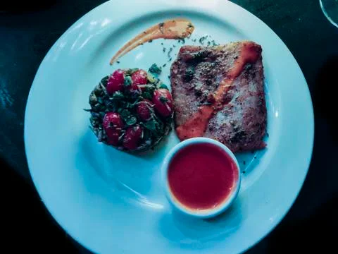 Fish platter with vegetables Stock Photos