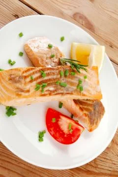 Fish portion : roasted salmon Stock Photos