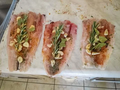 Fish Preparation Kitchen Scene 스톡 사진