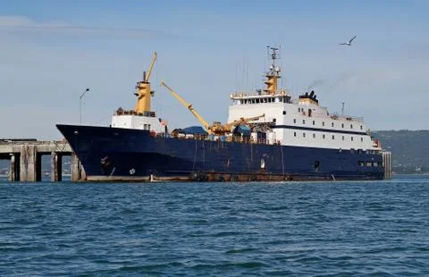 Fish processing boat in the bay Stock Photos