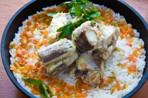 Fish &amp; rice with vegetables Stock Photos