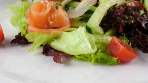 Fish salad, close-up view, Salmon with vegetables, served with cherry tomatoes Stock Footage 81002619