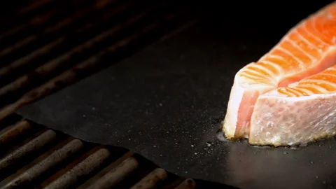 Fish salmon cuts being grilled Stock Footage 130063837