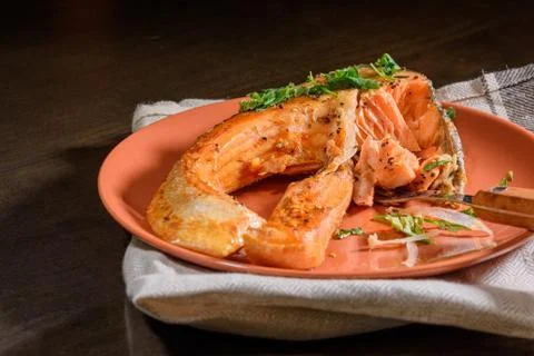 Fish salmon fried. On a platter. Stock Photos