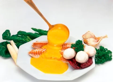 Fish with sauce Stock Photos