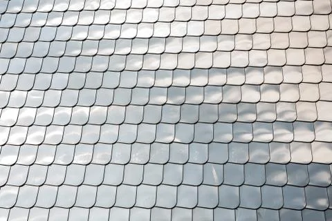Fish scale texture silver metal shape wall cover chrome reflection background Stock Photos