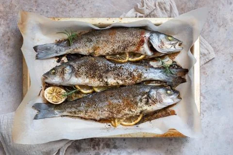 Fish seabass roasted with lemon Stock-Fotos