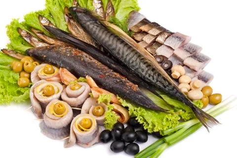 A fish set with vegetables Stock Photos