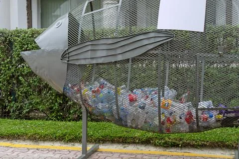 Fish shape plastic recycling container Fotos de archivo