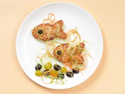 Fish shaped cutlets Stock Photos