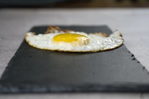Fish-shaped fried egg Stock Photos