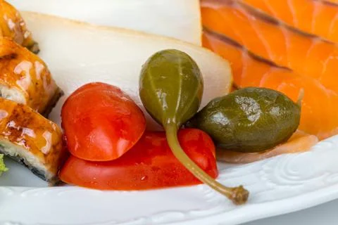 Fish snacks with red tomato Stock Photos