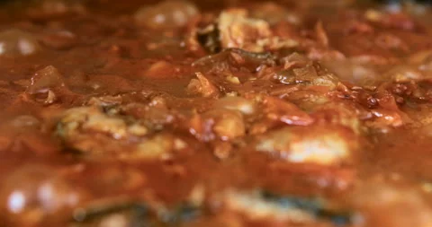 Fish soup is boiling in a pot on the kitchen Stock Footage 108383354