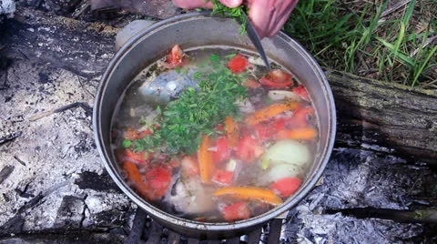 Fish soup on fire outside Video stock 24878195