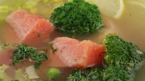 Fish soup with salmon and broccoli Stock Footage 57735843