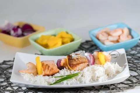Fish spit with rice Stock Photos
