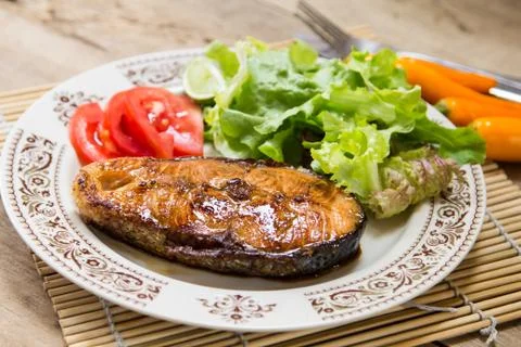 Fish steak. Stock Photos