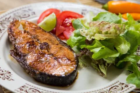 Fish steak. Stock Photos