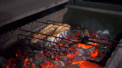 Fish steak roasted on the grid Stock Footage 154551755