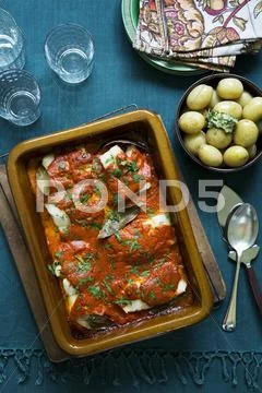 Fish stew with paprika sauce; served with boiled potatoes Stock-Fotos
