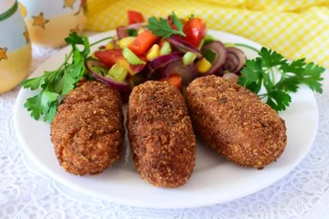 Fish sticks in breadcrumbs coating, deep fried Stock Photos