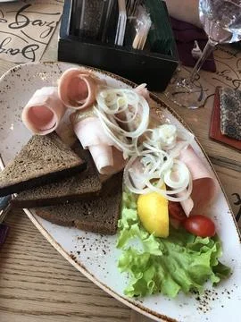 Fish stroganina. Fish cut into thin slices, restaurant Stock Photos