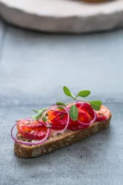 Fish Tapas on Crusty Bread, bread and cured salmon Stock Photos