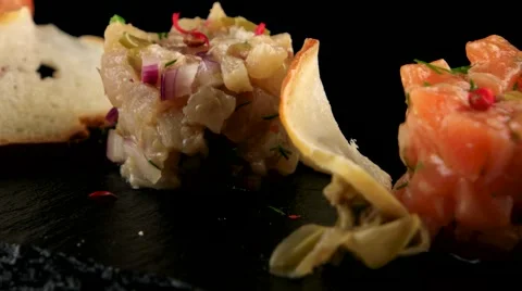 Fish tartare with crisp bread, closeup Stock Footage 66480371