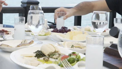 Fish Tavern Appetizer Meze Tapas Raki Ouzo Table Stock Footage 148342533