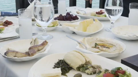 Fish Tavern Appetizer Meze Tapas Raki Ouzo Table Stock Footage 148344265