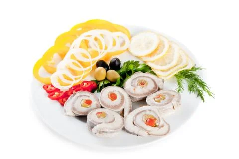 Fish with vegetables and olives Stock Photos