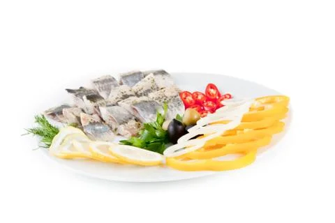 Fish with vegetables and olives Stock Photos