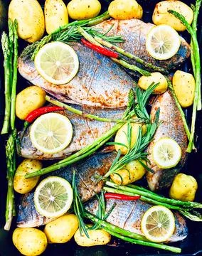 Fish vegetables and paprika Stock Photos