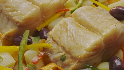 Fish with vegetables Stock Footage 98299605