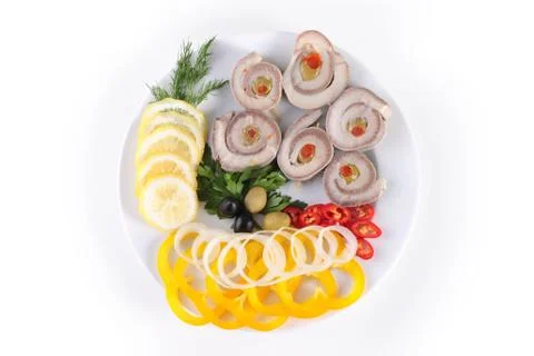 Fish with vegetables Stock Photos