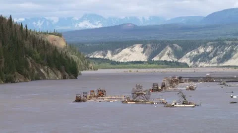Fish Wheels in Copper River - Distant Mountains - Brighter Stock Footage 21705421