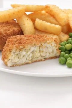 Fishcake chips and peas Stock Photos
