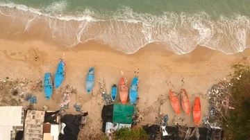 Fisher boats on the beach Stock Footage 85599525