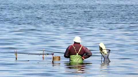 Fisher on lake Stock Footage 8607958