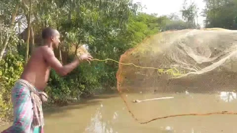 Fisher man catching fish  throwing spinning net Stock Footage 171081794