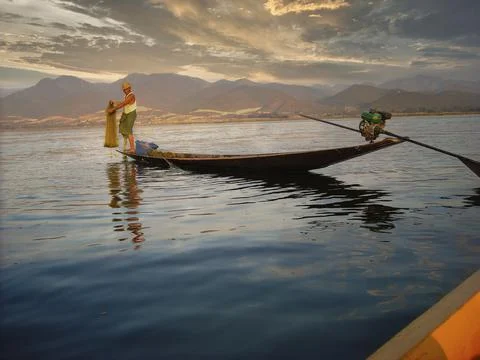 A fisher is preparing his trap Stock Photos