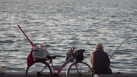The Fisherman And The Bicycle Stock Footage 128719084
